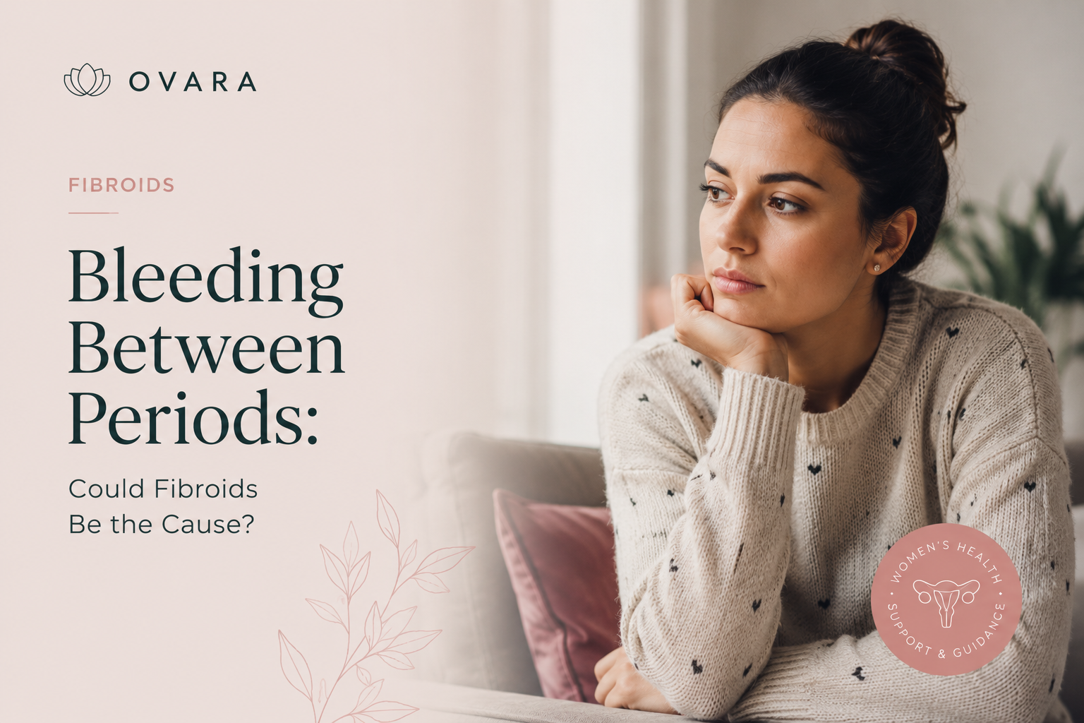 Thoughtful woman resting her chin on her hand on a sofa, reflecting concerns about bleeding between periods caused by fibroids